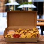 Eco-friendly #10 clam shell box securely holding hot meals, ensuring safe delivery and reducing environmental impact.