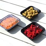 Two-compartment 12oz black PP microwavable container, perfect for meal prep and efficient food storage.