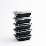 Stackable 16oz microwavable containers with black base and clear lid, designed for space-saving storage."