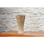 Biodegradable paper straws on a café table, ideal for eco-friendly restaurants and bars