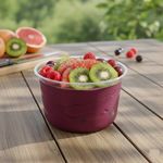 Top-down view of clear 8oz round RPET container filled with fresh acai bowl, showing vibrant fruit toppings