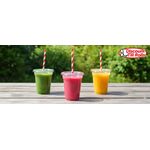 Clear rPET juice cup filled with orange juice for café service.