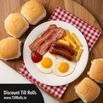 Detailed close-up of the high-quality, leak-resistant surface and ribbed rim of a 9-inch biodegradable paper plate with a fried meal.