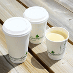 Close-up view of unique aqueous lining in 16oz Greenspirit compostable cup, highlighting its recyclable and repulpable design