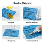 Zebra-compatible blue shipping label roll beside desktop thermal printer like GK420d or LP 2844