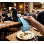 Image of a person holding a blue coloured credit card receipt