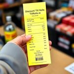 Sealed box of 20 bright yellow credit card paper rolls, coreless design for easy loading, shipped free across Ireland  www.DiscountTillRolls.ie