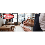 Carbonless order pad duplicate copy being filled during table service in a Dublin café.