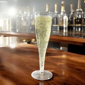 Clear polystyrene champagne flute, 10cl capacity, durable and elegant disposable drinkware.