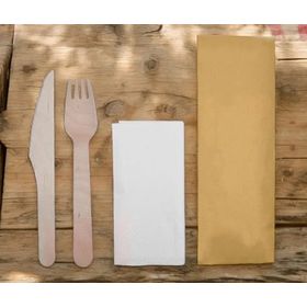 Image of wooden fork, knife, and napkin in compostable packaging