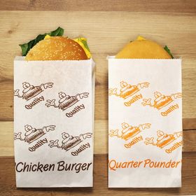 Greaseproof chicken burger bag securely holding a chicken burger, ensuring mess-free transport for customers