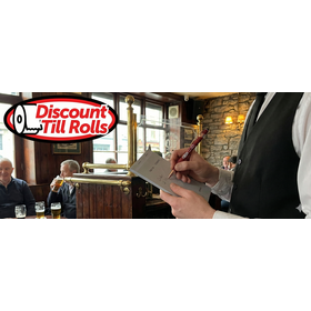 Waiter writing an order on a Duplicate Service Pad 165x95mm in a busy Irish restaurant.
