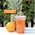 12/15oz_Greenspirit_Juice_Cups_with_orange_juice_100%_recyclable_PET.png