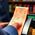 Orange_Thermal_Receipt_in_customers_hand_TillRolls.ie_2.jpeg