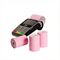 Image of credit card terminal with pink credit card rolls in front of the terminal supplied by Discount Till Rolls